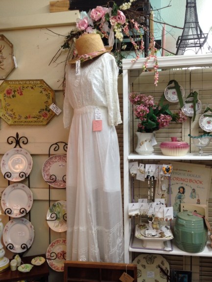 Look at that gorgeous white lawn dress. Right out of Downtown Abbey!